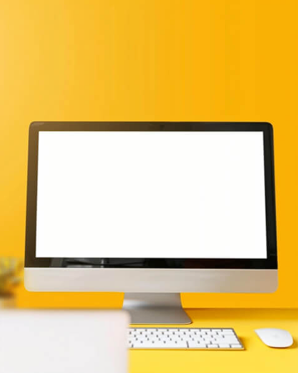 modern computer monitor on yellow background